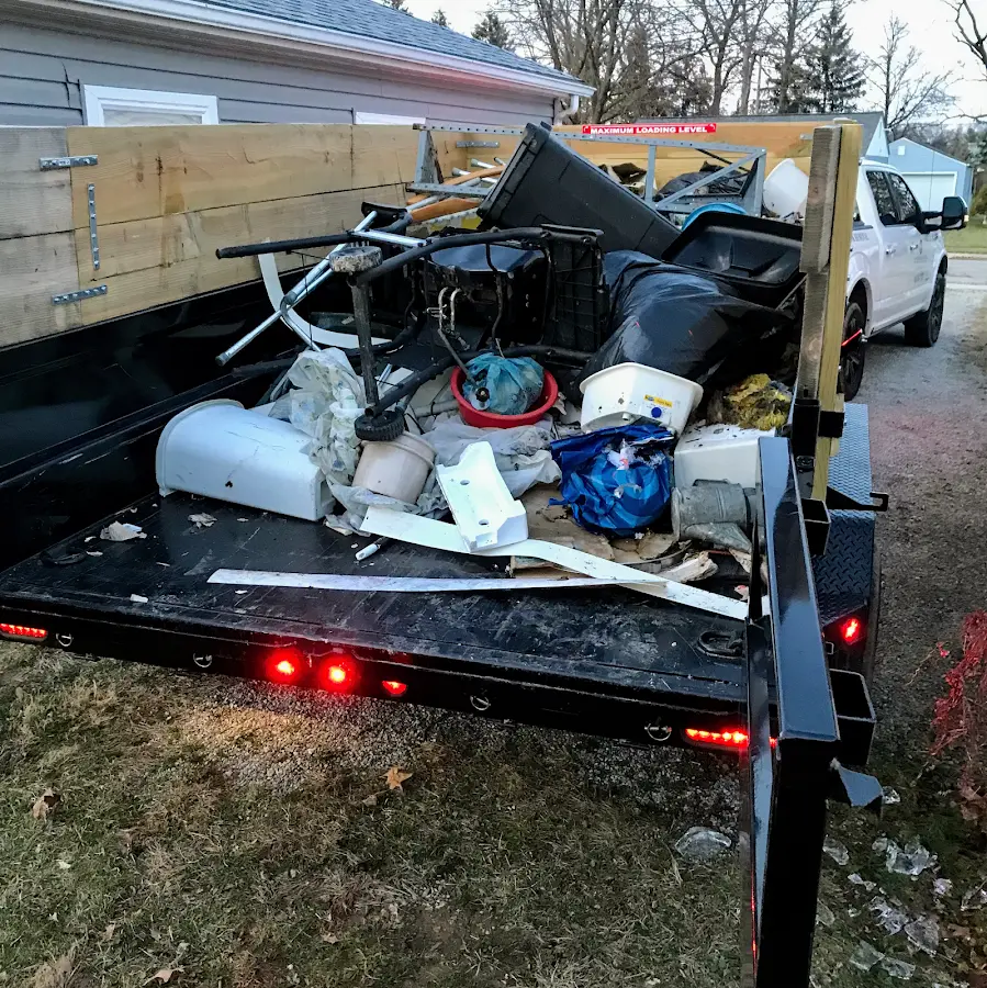 Roll-off dumpster delivered to a residential driveway in Newport